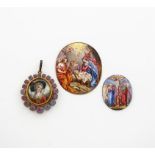 A collection of three early 19th century enamel plaques, comprising: one of oval form with Mary