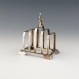 By Charles Boyton and Sons, a silver five bar toast rack, London 1932, also signed Charles Boyton,