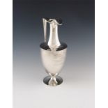A Victorian presentation regimental silver ewer, by Hunt and Roskell, London 1874, slender vase