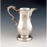 A George III Irish silver beer jug, maker's mark partially worn, possibly that of Owen Hart,