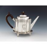 A George III silver teapot and stand, by William Abdy, London 1788, lobed oval form, bright-cut