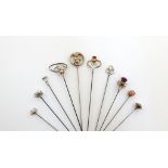 A collection of ten Charles Horner silver hat pins, Chester, various dates, including: two with