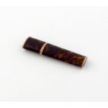 λ An early 19th century gold-mounted tortoiseshell sealing wax case, unmarked, tapering oval form,