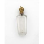 A 19th century French silver-gilt mounted glass scent bottle, marked with control marks, tapering