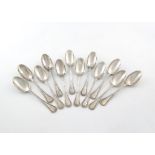 A set of twelve French silver Ribbon and Thread pattern dessert spoons, by Emile Puiforcat, Paris