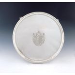 A George III silver salver, by Elizabeth Jones, London 1792, circular form, reeded border, the