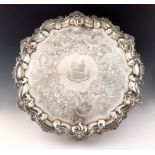A George III silver salver, by Crouch and Hannam, London 1788, circular form, foliate scroll border,