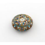 A Russian silver-gilt and enamel box, maker's mark unknown, 1896-1908, circular form, with vari-