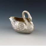 A Victorian novelty silver swan cream jug, by E. H Stockwell, London 1868, modelled as a swimming