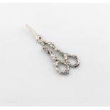 A pair of Victorian silver grape scissors, by Francis Higgins, London 1857, the ring handles with