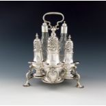 A George II silver Warwick cruet stand, by Samuel Wood, London 1748, one caster by a different