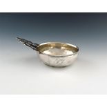 An unmarked silver porringer / bleeding bowl, probably early nineteenth century, possibly colonial,