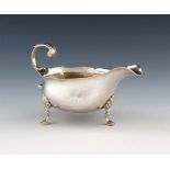 A George II silver cream / small sauce boat, maker's mark partially worn H ?, London 1758, oval