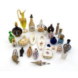 A collection of scent bottles, various materials,  comprising: one of fish form, a French hard stone