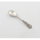 By Omar Ramsden and Alywn Carr, an Arts and Crafts silver spoon, London 1918, tapering handle, the