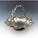 A Victorian silver swing-handled basket, by Roberts and Slater, Sheffield 1874, shaped circular