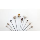 A collection of ten Charles Horner silver hat pins, Chester, various dates, including: a yellow