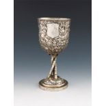 A mid-19th century Chinese silver goblet, by Hoaching, Canton circa 1887, urn shaped bowl, chased