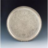 A George III silver salver, by Crouch and Hannam, London 1778, circular form, later embossed foliate