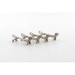 A set of four modern novelty silver dog knife rests, by Roberts and Dore Limited, Sheffield 1973,