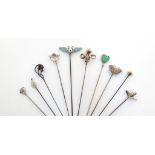 A collection of ten Charles Horner silver hat pins, Chester, various dates, including: a blue/
