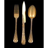 A three-piece Victorian silver-gilt Newton pattern christening set, by George Adams, London 1872 and