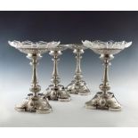 A set of four Victorian silver tazzae, by John Samuel Hunt, London 1862, also engraved 'John