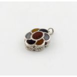 A Victorian silver and agate vinaigrette, by James Fenton, Birmingham 1857, shaped oval form, the