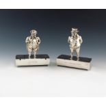 A pair of late-Victorian silver novelty figural cruet sets, by E. C. Brown, London 1878, with a