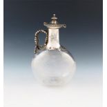 A Victorian silver-mounted claret jug, by Robert Hennell, London 1863, ovoid form, the mount with