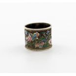 A Russian silver and enamel napkin ring, 1908-1917,  circular form, with foliate enamel decoration