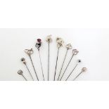 A collection of ten Charles Horner silver hat pins, Chester, various dates, including: one with a