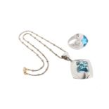 A blue topaz mounted white gold ring by Bulgari, the sugar~loaf topaz in bombé shaped 18ct white