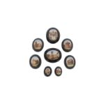 Eight graduated 19th century oval micro mosaic panels, depicting various ruined buildings in the