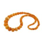 An amber bead necklace, 76cm 113g.