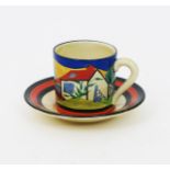 'Applique Blue Lugano' a Clarice Cliff Tankard coffee can and saucer, painted in colours printed and