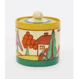 'Pastel Trees and House' a Clarice Cliff Fantasque Bizarre Cylindrical preserve pot and cover,