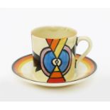 'Lightning' a Clarice Cliff Bizarre Tankard coffee can and saucer, painted in colours printed