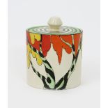 'Honolulu' a Clarice Cliff Fantasque Bizarre Cylindrical preserve pot and cover, painted in