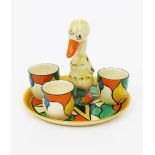 'Double V' a Clarice Cliff Bizarre Duck egg cruet set,  comprising tray with central duck handle,