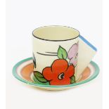 'Poplar' a Clarice Cliff Bizarre Conical coffee can and saucer, painted in colours printed factory