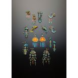 SEVEN PAIRS OF CHINESE GILT METAL AND KINGFISHER FEATHER EARRINGS QING DYNASTY Variously formed as