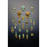 A COLLECTION OF CHINESE GILT METAL AND KINGFISHER FEATHER EARRINGS QING DYNASTY Comprising eight