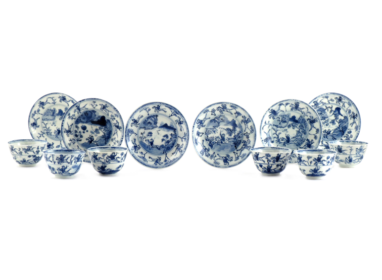 A SET OF SIX CHINESE BLUE AND WHITE TEA BOWLS AND SAUCERS YONGZHENG 1723-35 Painted with
