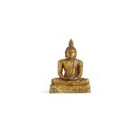 A SMALL SRI LANKAN GILT BRONZE FIGURE OF BUDDHA 17TH/18TH CENTURY Seated in dhyanasana on a double