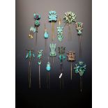 A COLLECTION OF CHINESE GILT METAL AND KINGFISHER FEATHER HAIR ORNAMENTS QING DYNASTY Formed as