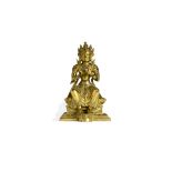 A RARE CHINESE GILT BRONZE FIGURE OF MAITREYA 18TH CENTURY Seated with his knees slightly apart on a