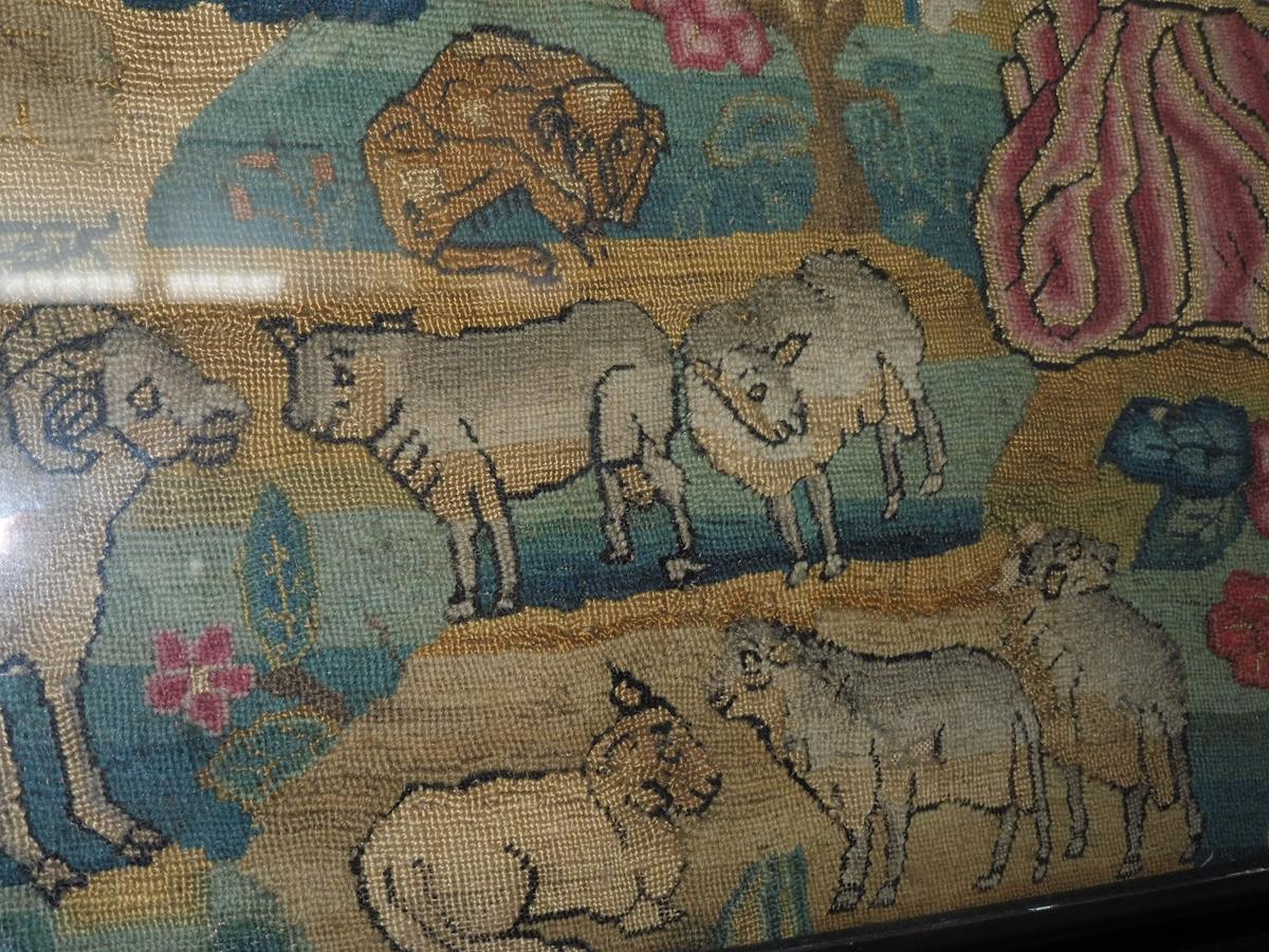 A needlework picture, worked in wool with some raised work, depicting a shepherd and shepherdess - Image 6 of 15