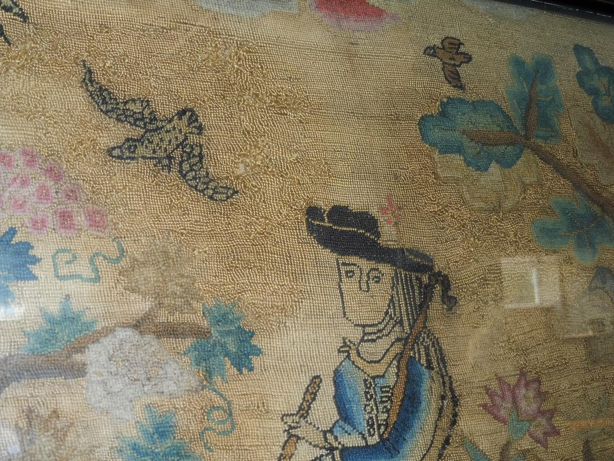 A needlework picture, worked in wool with some raised work, depicting a shepherd and shepherdess - Image 7 of 15