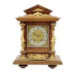 A German oak quarter striking mantel clock, two-train movement by Lenzkirch striking on two gongs,